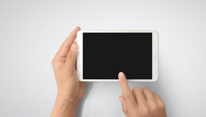 Hands holding tablet touch computer gadget