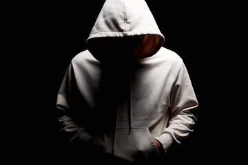 Person in Hood. Boy in a hooded sweatshirt
