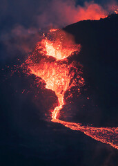 Lava exploding in from the volcano, low light photo of the volcanic crater in Iceland. 