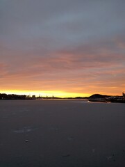 sunset by the docks in the city in the winter