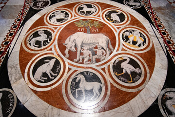 The She-Wolf of Siena, one of the panel of mosaic floor in Siena Cathedral in Siena, Italy