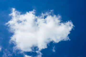 Naklejka na ściany i meble Blue sky and white clouds on a beautiful day.