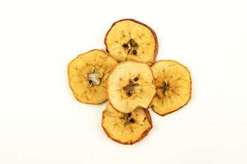 Dried apple chips slices composition isolated on white background. Top above view. Flat lay