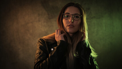 Strong colorful portrait shot of a young woman - studio photography