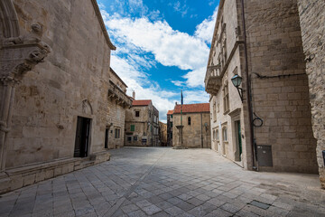 Narrow street in Korcula old town, Croatia on the coast of the island of Korcula