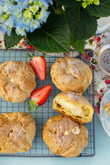 Sweet puffs of choux pastry and custard cream
