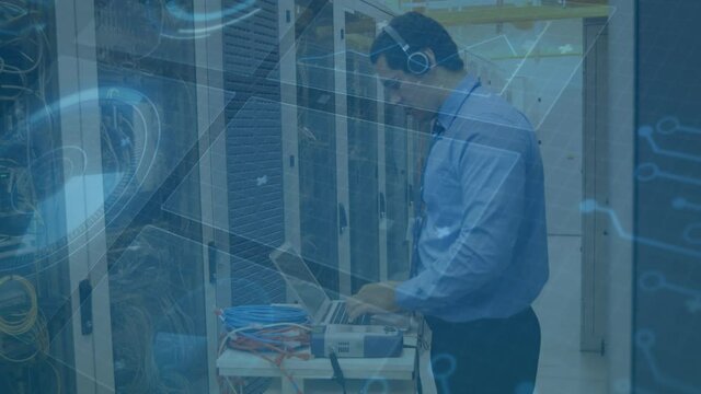 Animation of scopes scanning and data processing on screens over man checking computer servers