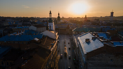 aerial view of sunset above old european city