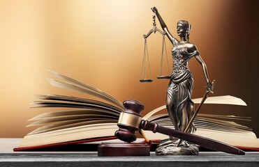 Sculpture justice bronze lady and open books and gavel