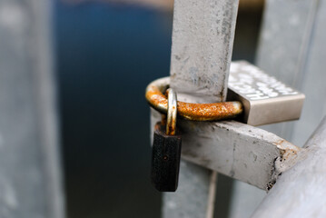 a bunch of locks that are left on bridges by couples in love. The emphasis is on old age, the strength of the bonds that the lock symbolizes.