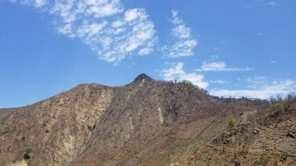 mountain landscape with blue sky and clouds
