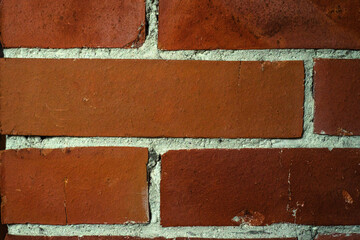 Photo of the texture of red brickwork with cement