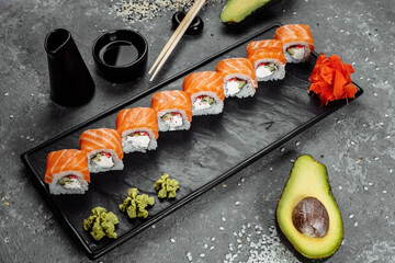 Sushi Philadelphia on a stone decorative plate