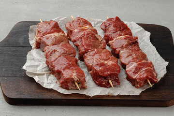 Raw beef kebab on skewers ready for barbecue