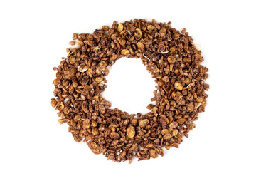 Ring, circle from organic homemade roasted granola cereal with oats, flax, almonds, chocolate isolated on white background. Top view muesli