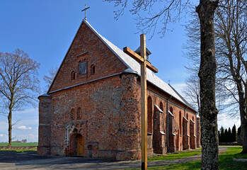 built in the second half of the 16th century in the Gothic style, the Catholic Church of st. Matthias in the village of Pawłowo in Masovia, Poland. The photos show a general view of the temple with th