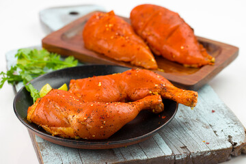 Marinated  chicken legs and breast fillet