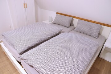 Fototapeta na wymiar Modern white small bedroom