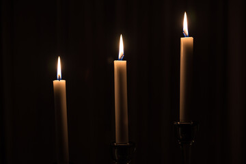 Three candles light