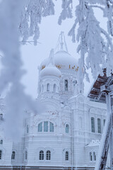 Belogorsk monastery on the mountain in winter, covered with white snow and frost. Belogorye, Perm Territory, Ural, Russia