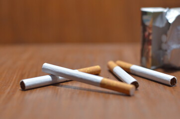 An up close view of a package of several cigarettes