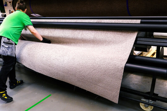 Modern carpet for textile design. The concept of industrial technology. Production automation. Textured background.