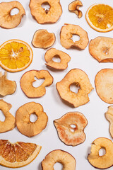 Dried fruit isolated on white background. Dried grapefruit, dried apple, dried pear.