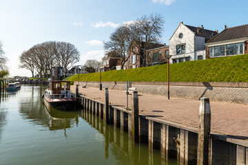 The small harbor in the picturesque fortified town of Schoonhoven on the river Lek in the Netherlands.