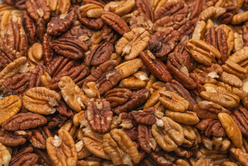 Tasty pecan-nut background. Top view.