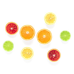 Various citrus fruits cut in half isolated on white background. Top view.