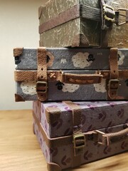 Craftsman makes miniature doll suitcases