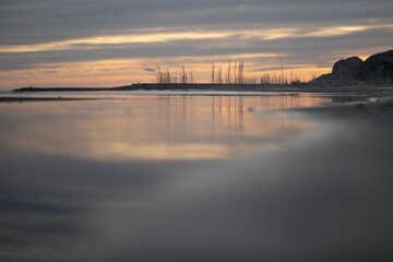 Reflections in the water of the setting sun. 