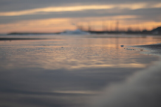 Beautiful reflections in the sea of the setting sun.