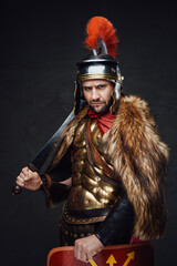 Military roman with fur against dark background