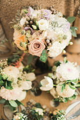 Beautiful wedding bouquet with different flowers, roses