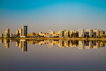 panoramic view of the city with reflection in the water