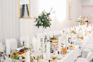 Interior of a restaurant prepared for wedding ceremony