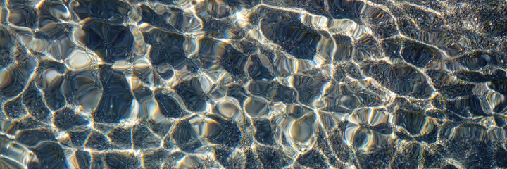 pebble water caustics background with color refractions