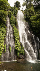 Banyumala Waterfall in a jungle sourrounding on Bali Island, Indonesia.