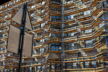 Scaffolding on the facade of an apartment building under construction