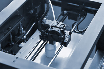 Objects printed by 3d printer. Automatic three dimensional 3d printer performs