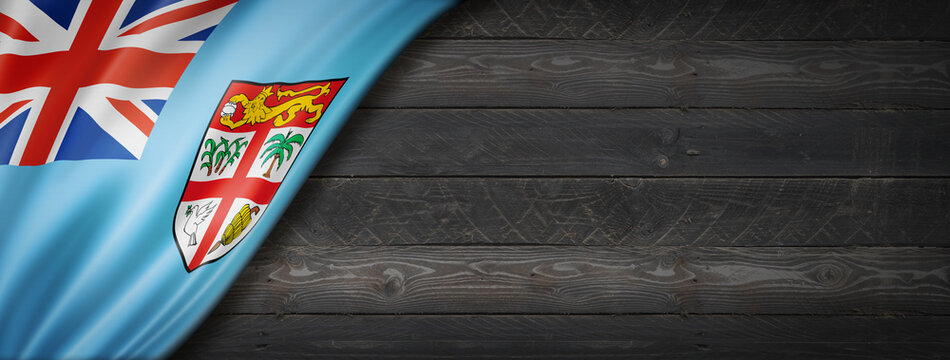 Fijian flag on black wood wall banner