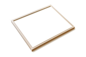 Wooden picture frame hanging on a white wall. Perspective view