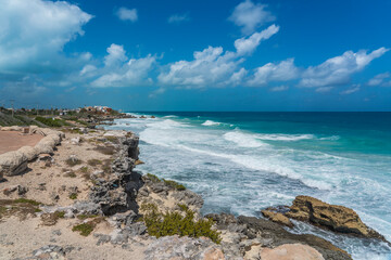 Rocky coastline with turquoise water on Isla Mujeres, South Point Punta Sur Cancun Mexico Island