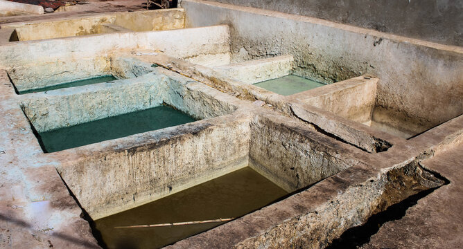 Dye pots at leather tanneries in Marrakesh, Morroco