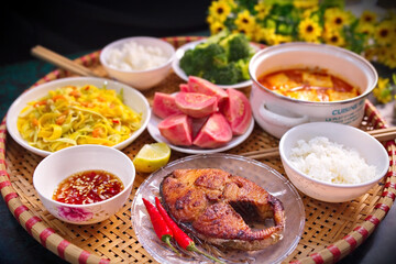 Fried fish dish in Vietnamese style family lunch set