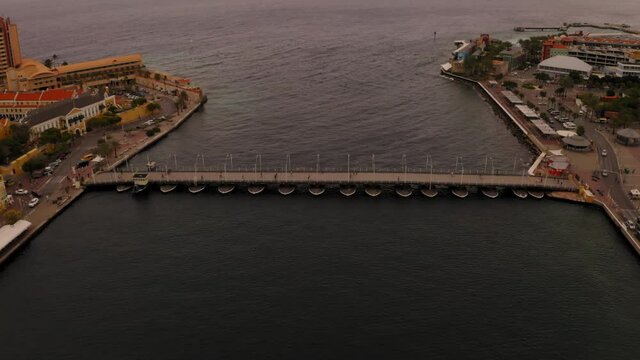 aerial drone image of the bridge in the city of curacao in the caribbean during the day