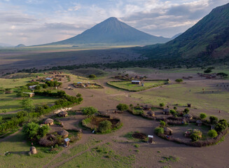 Aerial Drone Shot. Traditional Masai village at Sunset time near Arusha, Tanzania