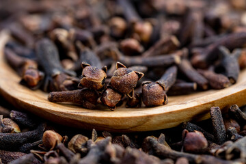 Macro photography of Cloves are the aromatic flower buds of a tree in the family Myrtaceae, Syzygium aromaticum.