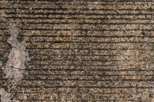 Closeup of dirty cement ground with pubble using for texture background.